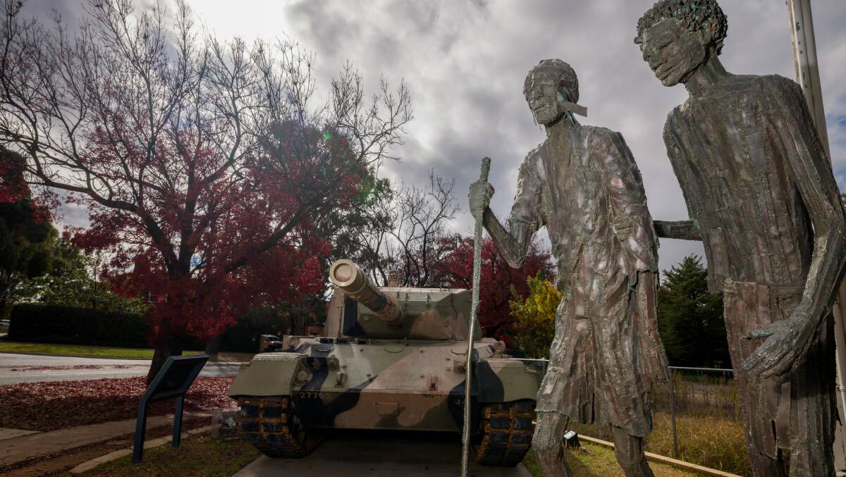 An army tank and the Kokoda Memorial, the only signs of what was once there. Picture by Sitthixay Ditthavong 