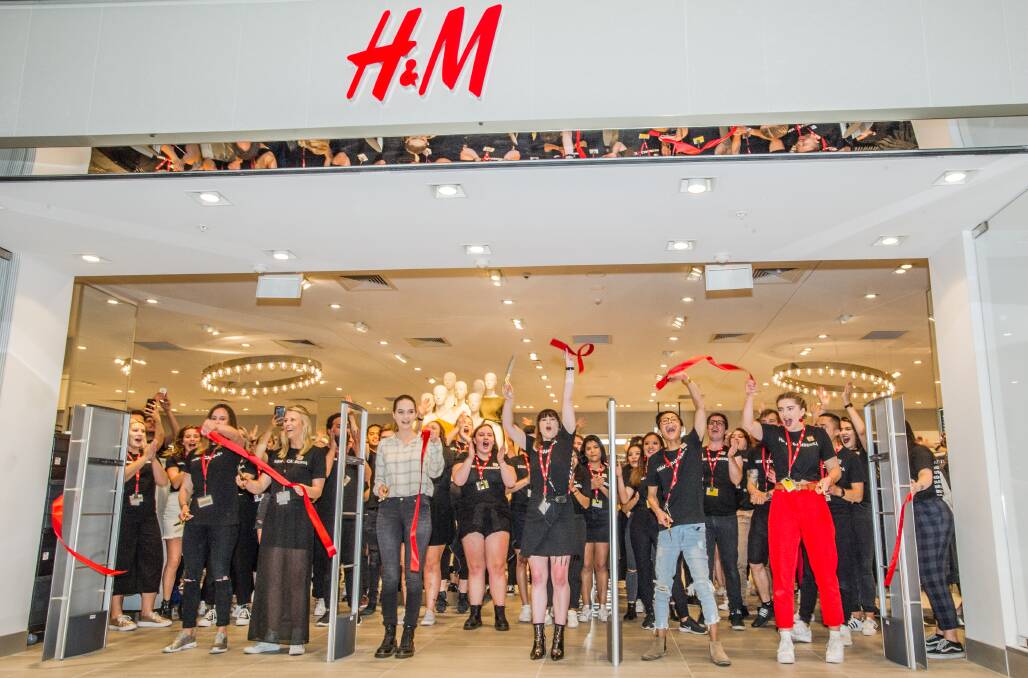 The ribbon is cut, officially opening Canberra's first H&M store at Canberra Centre. Picture by Karleen Minney