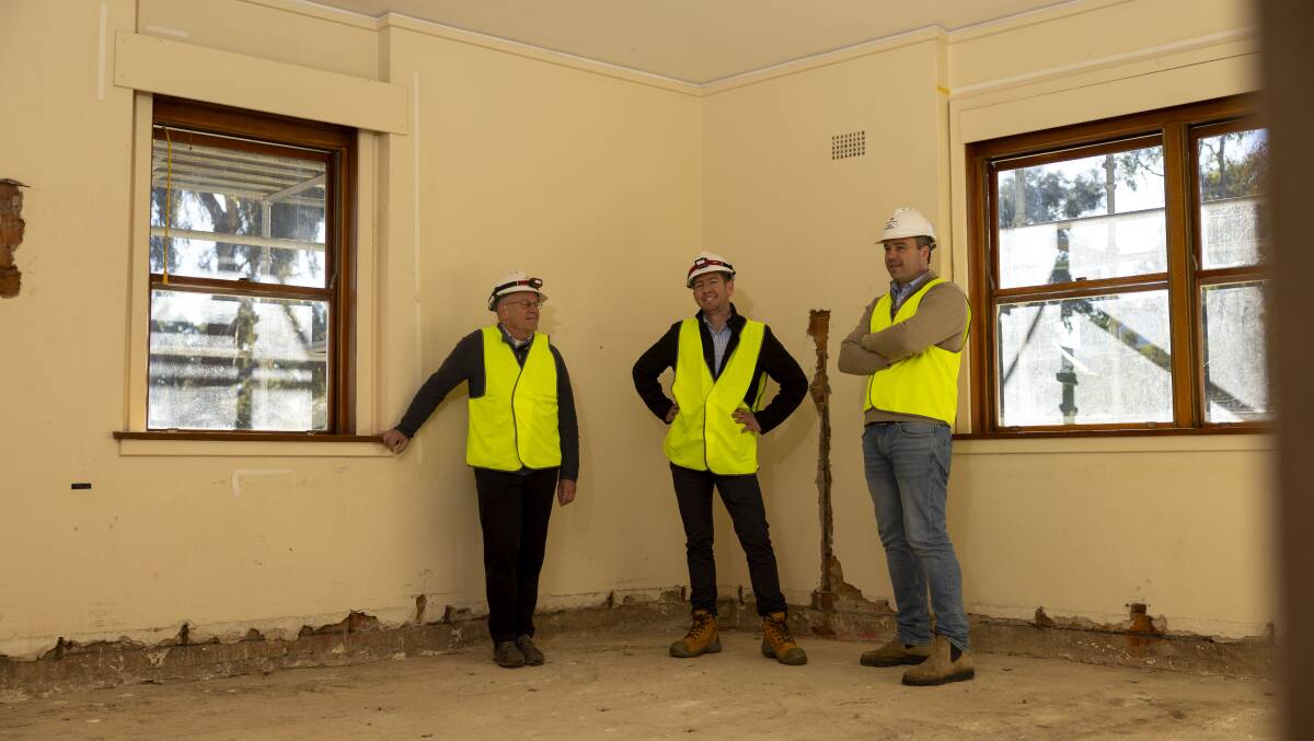 House master Professor Peter Kanowski in one of the gutted rooms of University House, with ANU Hail Remediation project director Ben Condren, and project manager Alex Morgan. Picture by Gary Ramage