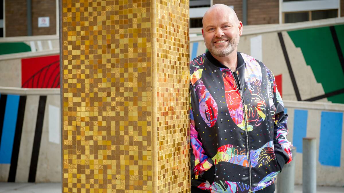 Daniel Clarke, head of programming at the Canberra Theatre Centre, in a jacket by First Nations artist Jessica Johnson. Picture by Elesa Kurtz 
