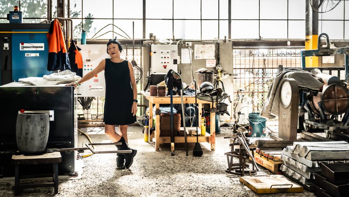 Lindy Lee in her happy place - the UAP foundry in Brisbane. Picture by Karleen Minney