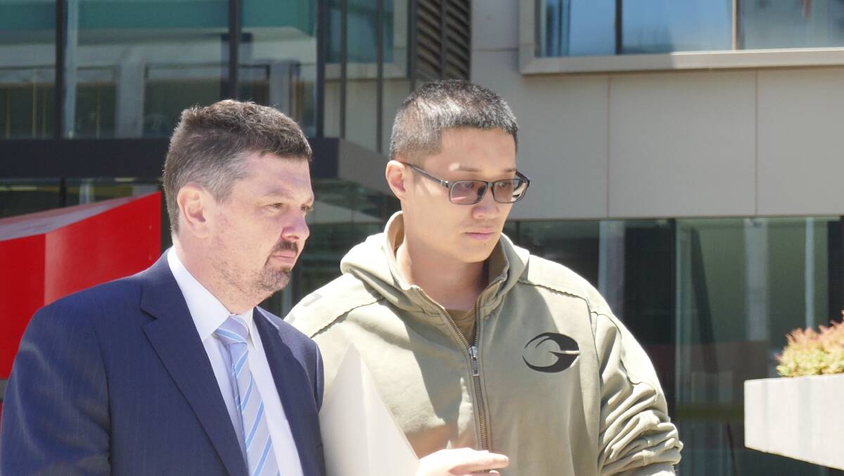 Wei Wang, right, with his lawyer Michael Kukulies-Smith on a previous occasion. Picture by Toby Vue