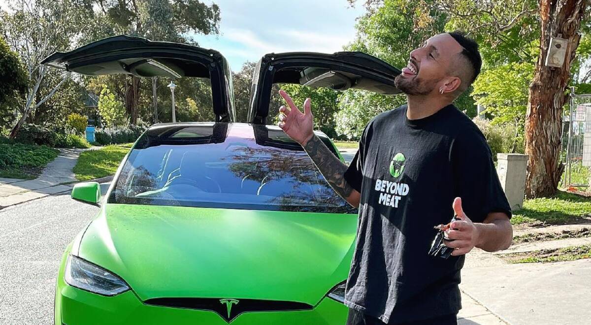 Nick Kyrgios with his green Tesla Model X. Picture Instagram