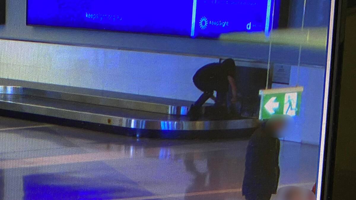 A still from CCTV footage showing the baggage carousel ride at Canberra Airport. Picture supplied