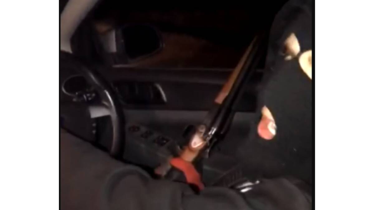 A still from footage showing the man shooting out of a stolen car. Picture supplied
