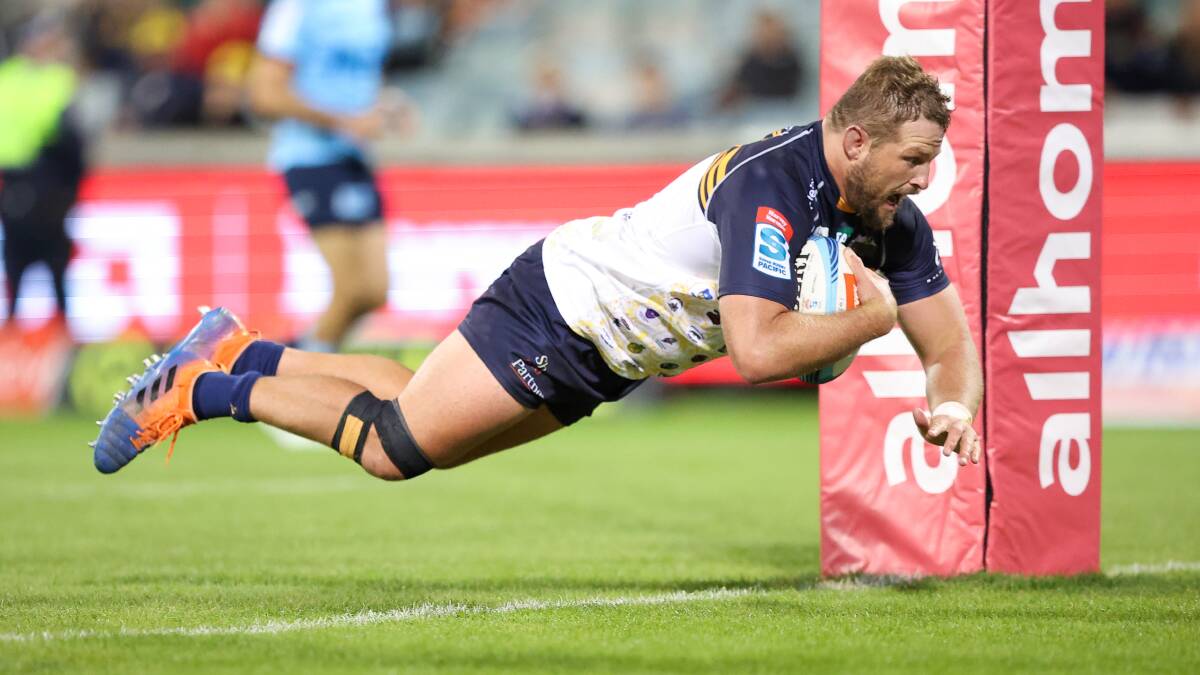 ACT Brumbies prop James Slipper crosses in Saturday night's clash with the Waratahs. Picture by Sitthixay Ditthavong