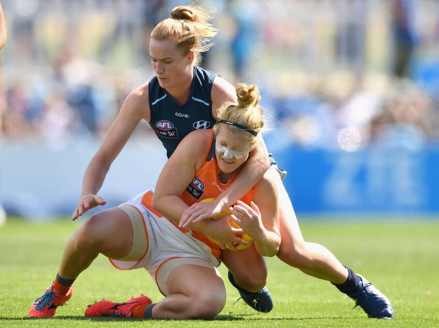 Former GWS Giant Brittany Tully is tackled during her AFLW career. Picture Getty Images