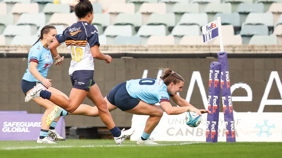 Former Brumby Ella Ryan scores for the NSW Waratahs on Saturday afternoon. Picture by Sitthixay Ditthavong