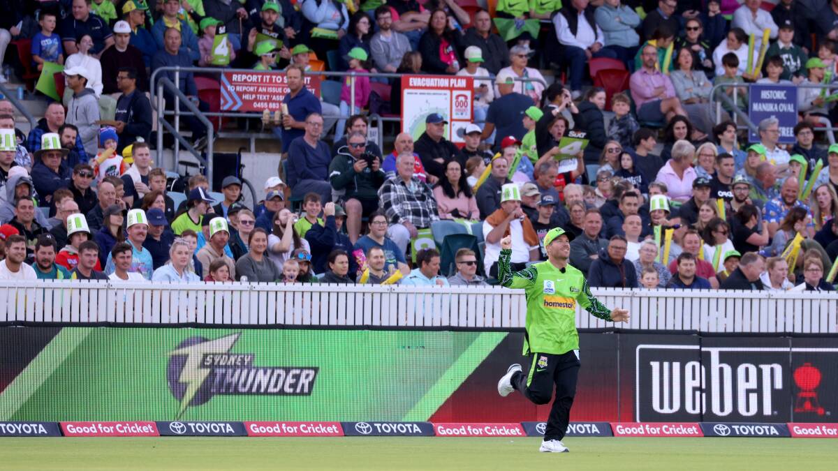 A large crowd packed into Manuka Oval to watch David Warner and the Sydney Thunder face play during last summer's Big Bash. Picture by James Croucher
