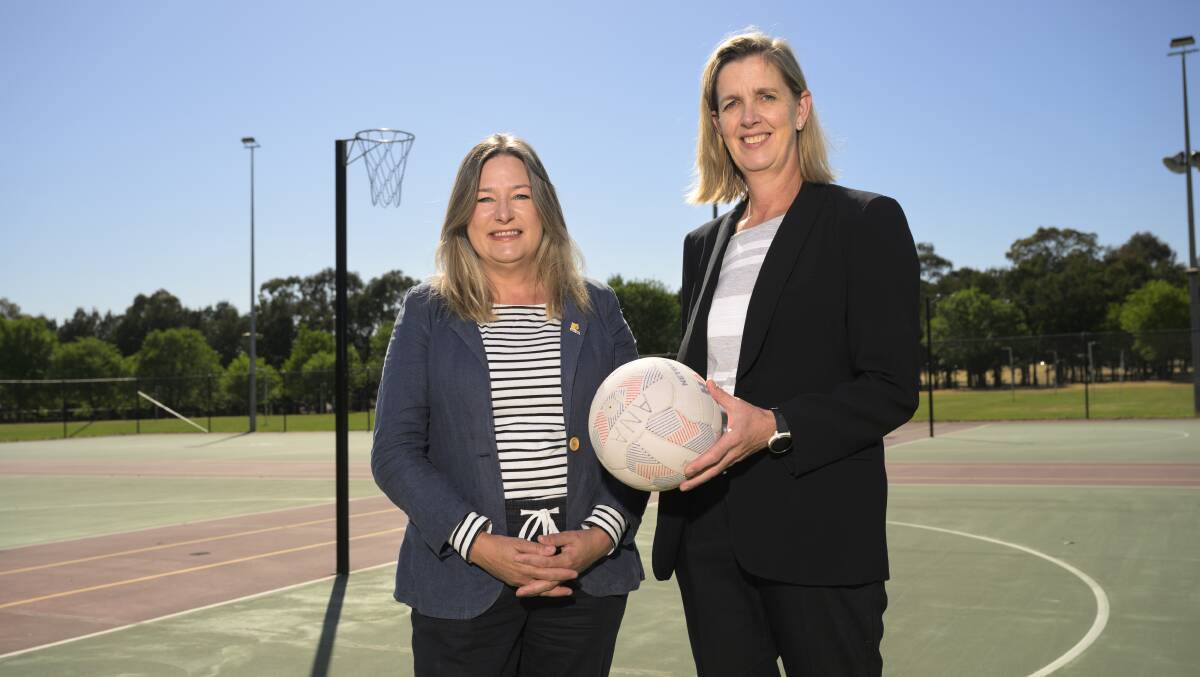 ACT Sports Minister Yvette Berry (left) and Netball ACT chief executive Sally Clark announced funding for netball courts across the territory on Tuesday. Picture by Keegan Carroll