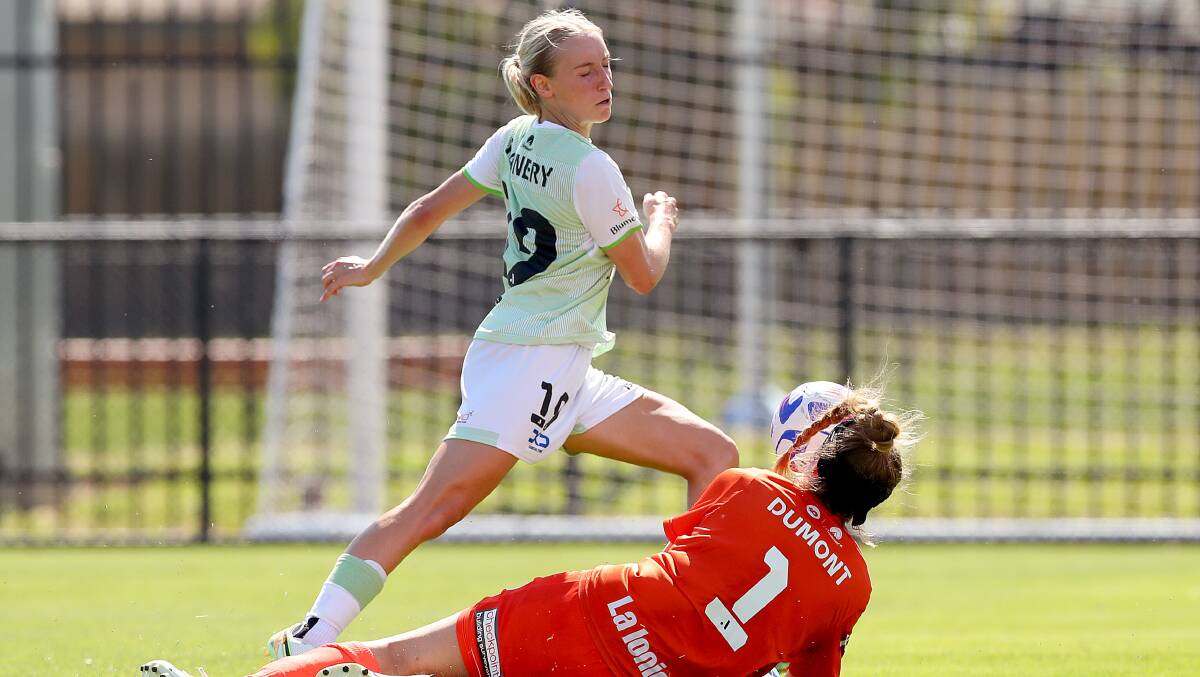 Canberra United's Nicki Flannery is denied by Victory goalkeeper Casey Dumont in Saturday's loss. Picture Getty Images