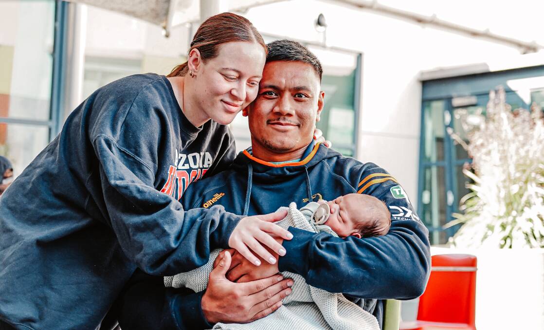 Len Ikitau and partner Sammie with their baby boy, Lennox. Picture ACT Brumbies Media