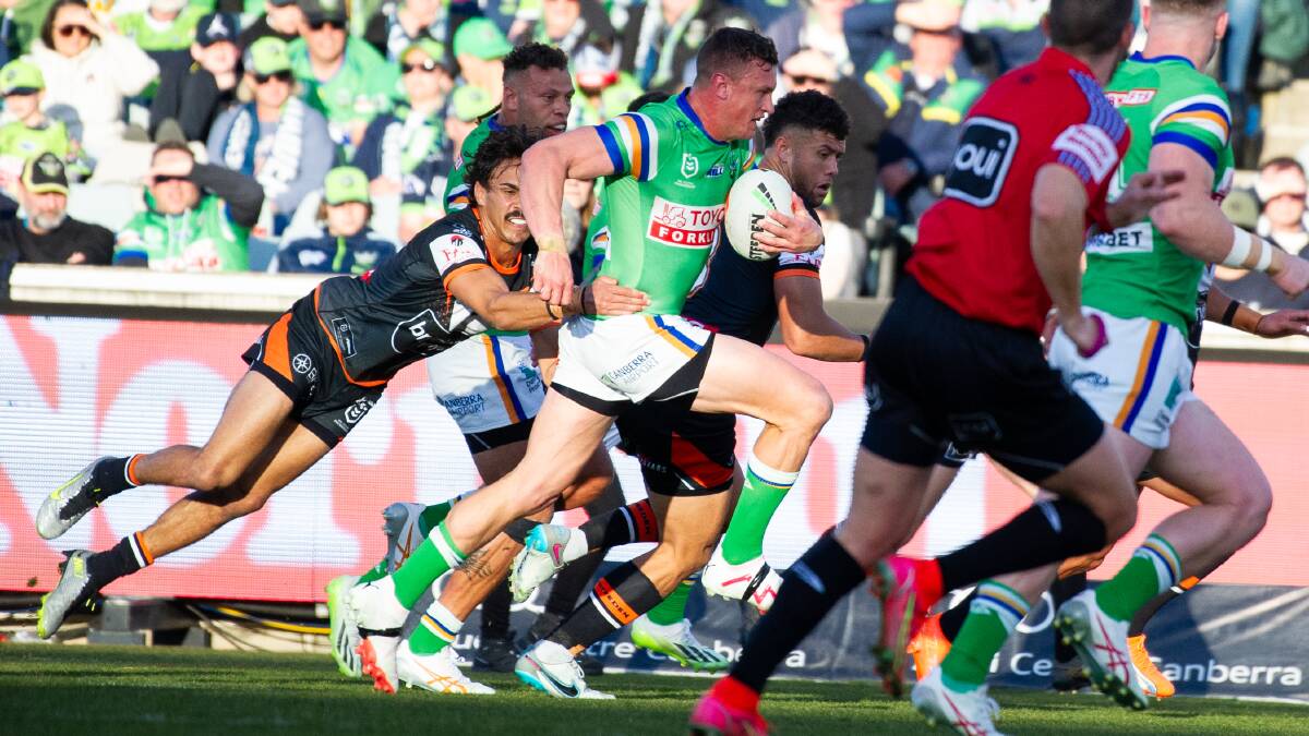 Raiders five-eighth Jack Wighton charges forward during Sunday's victory over the Tigers. Picture by Elesa Kurtz