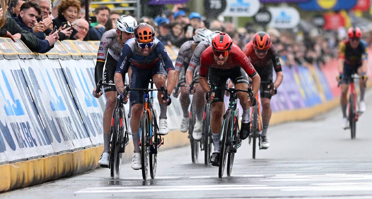 Michael Matthews, left, races to the finish line in the Tour of Flanders. Picture Getty Images