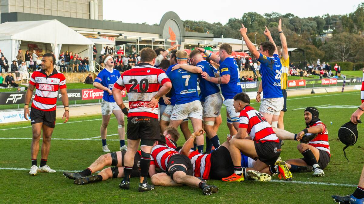 Royals celebrate the try that sent Saturday's qualifying final into extra-time. Picture by Elesa Kurtz