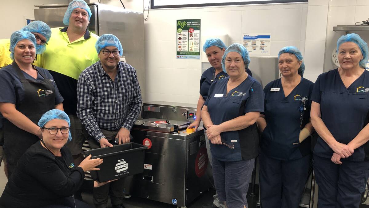 Staff at Hillgrove House being trained how to use the new food dehydrators by enrich360 CEO, Dean Turner and council's waste project officer, Rechelle Fisher.
