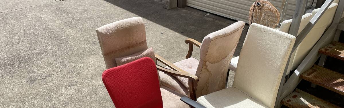 Old chairs at Vinnies including one heavily stained that will all have to be tipped.