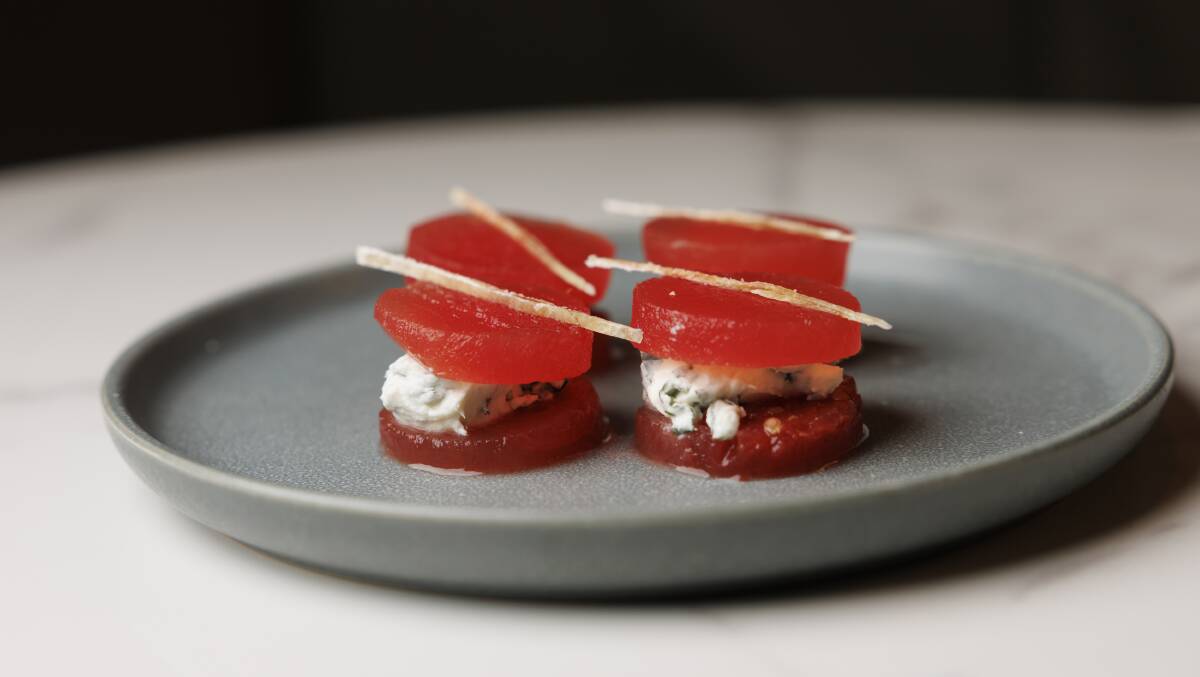 Compressed watermelon and feta bite. Picture by Keegan Carroll