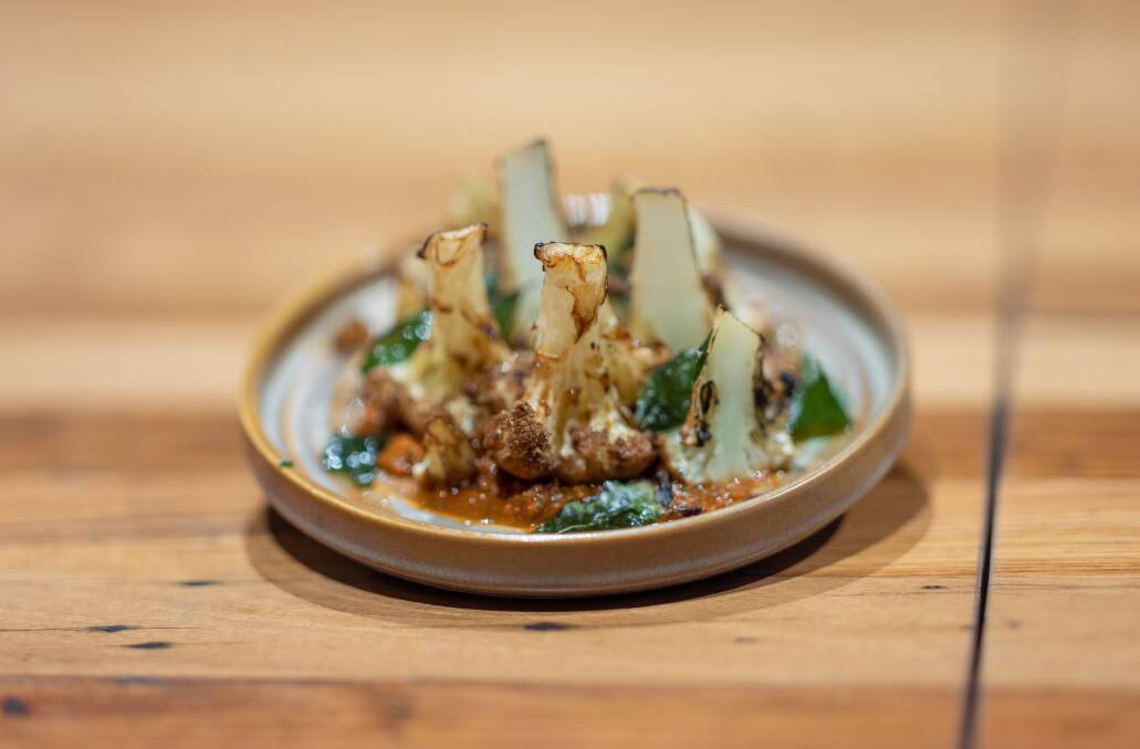 Fried cauliflower with vincotto, harissa, soy seed and patis. Picture by Gary Ramage