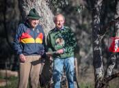 The late Bob Mouatt, left, with David Hogg at the 50th birthday celebrations for Orienteering ACT in 2021. Picture: Karleen Minney
