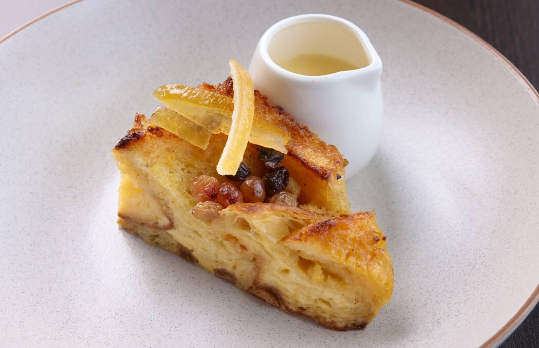 Marmalade bread and butter pudding with candied clementines and white chocolate and brandy custard. Picture: James Croucher 
