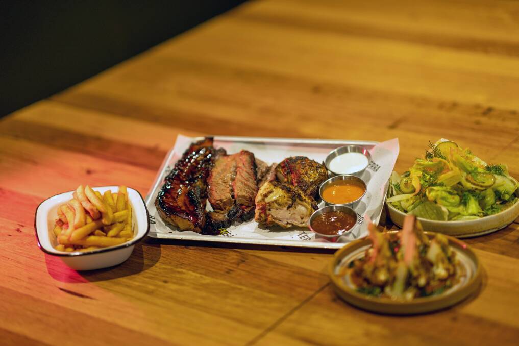 The Feed Me menu features a selection of three meats and three sides. Picture by Gary Ramage 
