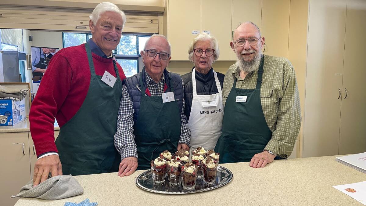  Peter Munro, John Seymour, Maryann Wickham and Phillip McGuire with dessert. Picture by Karen Hardy