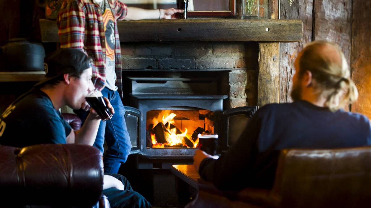 Have food and wine events in front of fireplaces like this one at the Old Canberra Inn. Picture: Elesa Kurtz