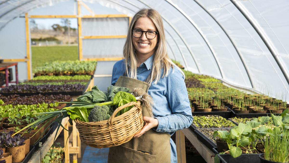 Dimity May with her seedlings at Pialligo Lots. Picture: Keegan Carroll