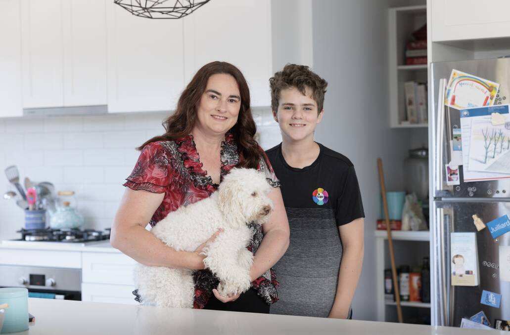 Emma and her son Sebastian, 12, and dog Frank. Picture by Keegan Carroll