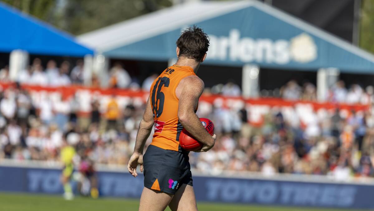
Brent Daniels of the GWS Giants kicks for goal. Picture by Gary Ra