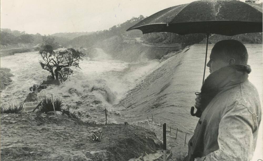 NCDC commissioner inspects the Googong Dam wall, October 1976. Picture by Martin Jones for The Canberra Times, courtesy of CMAG's Canberra Press Photography Collection, 2018