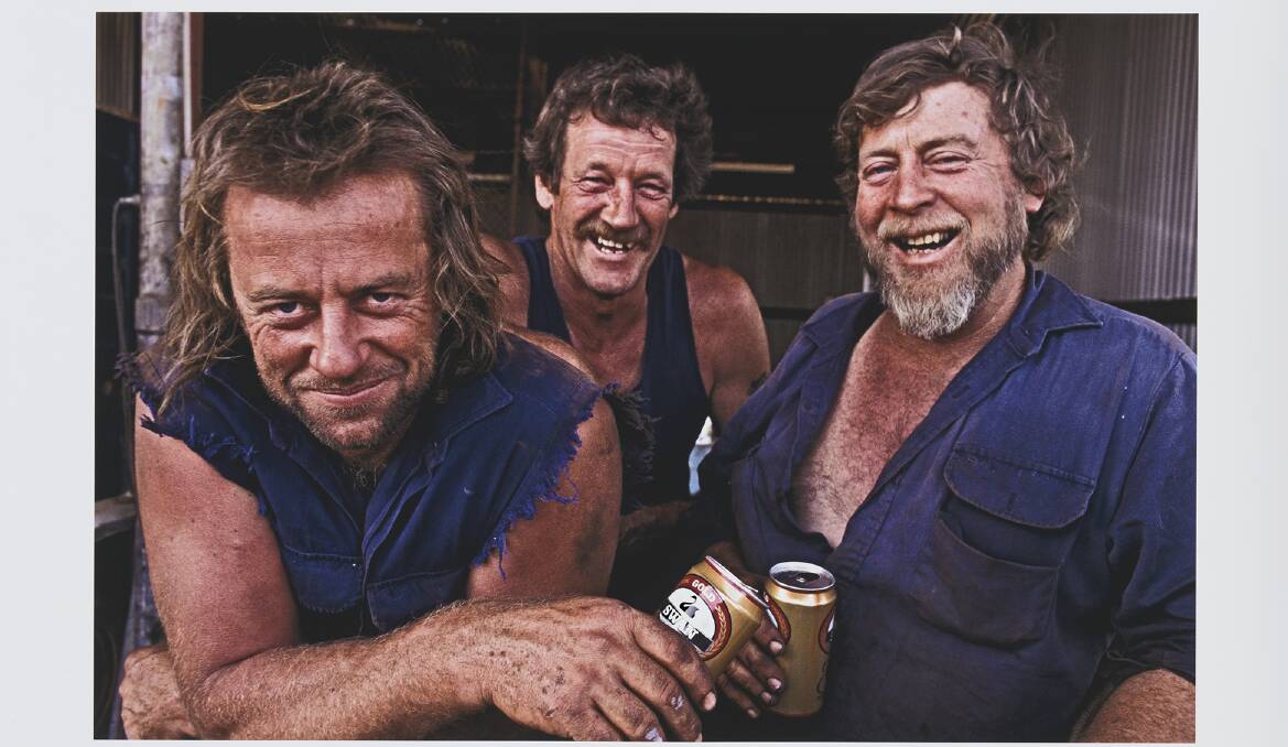 Council mechanics, Jack Western, Bob Mackenzie and Bryan Steele having a drink of beer, Gascoyne Junction, Western Australia, ca. 1995. Picture by Bill
Bachman