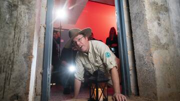  Tim the Yowie Man tries to get to the bottom of the Pyjama Girl Mystery at the National Film and Sound Archive. Picture supplied