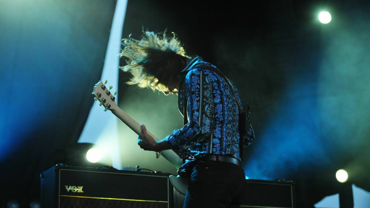 
Hoodoo Gurus lead guitarist Brad Shepherd in action. Picture by Scott Gelston