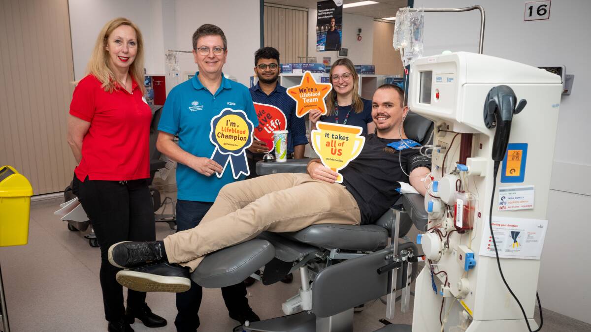 Red Cross group account manager Sally Deveson, left, AIHW group coordinator, Stirling Lewis with Australian Institute of Health workers Ramdileep Jale, Maddie Howlett and Dylan Van Essen donating blood. Picture by Elesa Kurtz