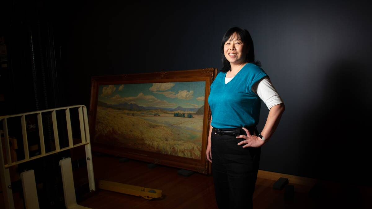 Acting Canberra Museum and Gallery director Anna Wong among items for the new exhibition Canberra: Places and People. Picture by Elesa Kurtz
