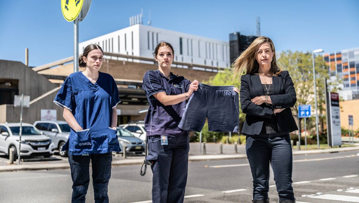 Wardspeople Bella Ambrosina and Emma Langdon, with CPSU president Brooke Muscat, say there is a gendered double standard with uniforms. Picture by Karleen Minney