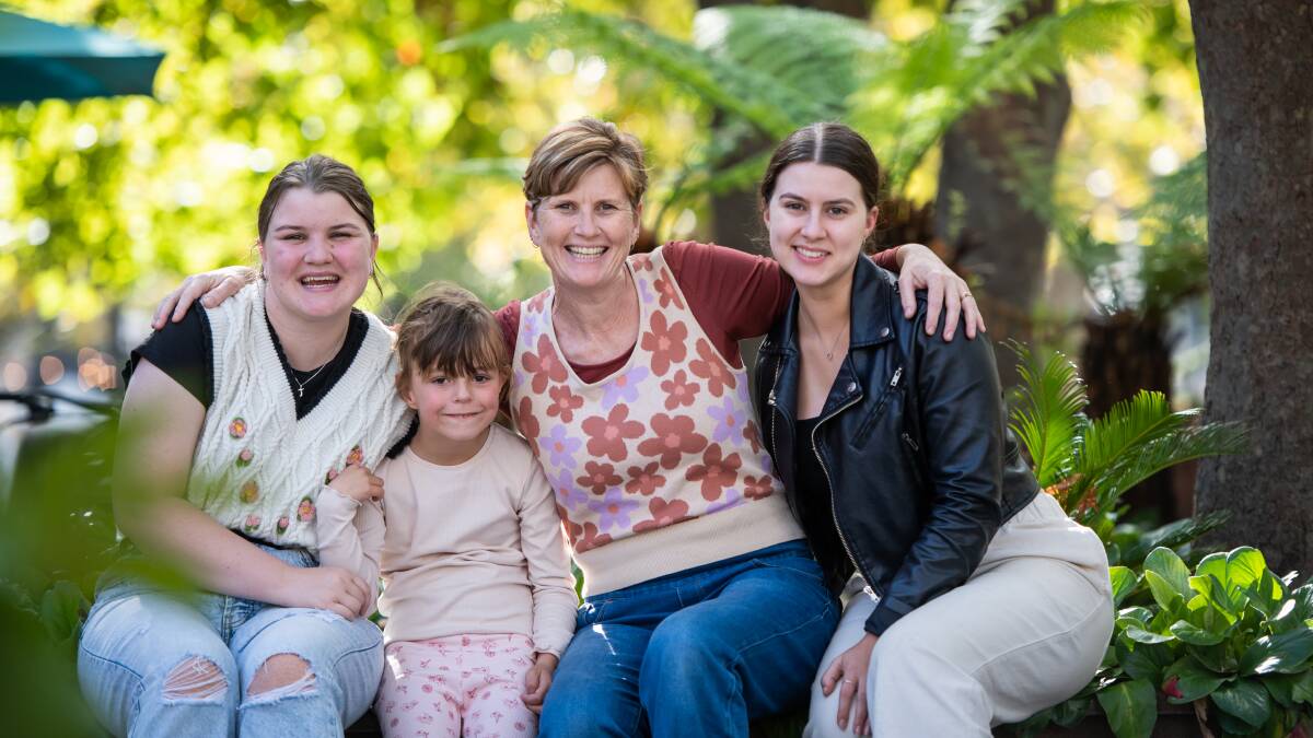 Fiona Tollis with three of her eight children (from left) Joanna, Jessie and Rachel. Picture: Karleen Minney 