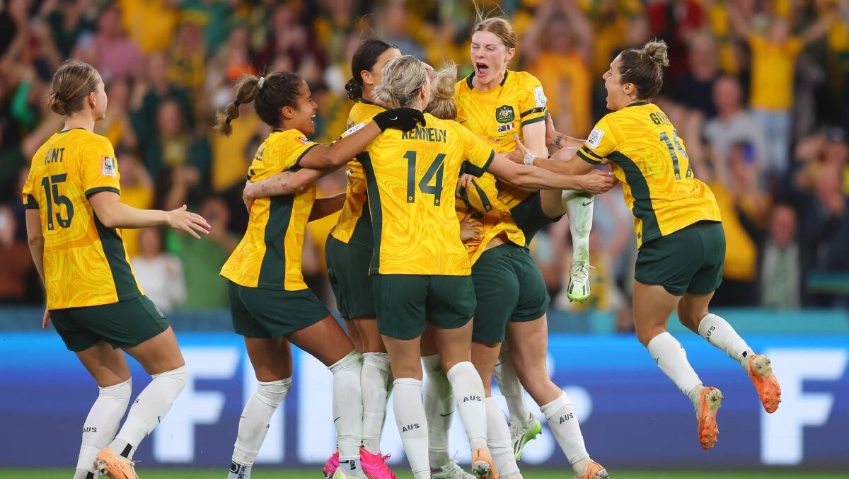 Cortnee Vine is mobbed after scoring the winning penalty. Picture Getty Images