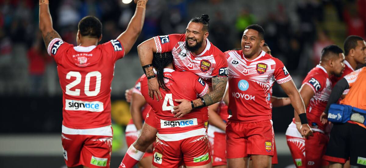 Tonga players celebrate their historic win over Australia. Picture: NRL Imagery