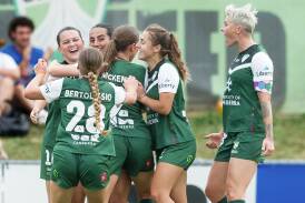 Canberra celebrate Mary Stanic-Floody's goal. Picture by Sitthixay Ditthavong