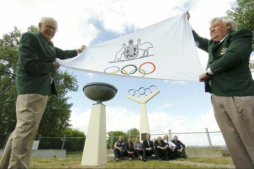 Ballarat's two original Olympians, high jumper John Vernon and boxer Bob Bath, celebrating 50 years since the 1956 Olympic Games at the Olympic rings monument at Lake Wendouree in 2006. Picture by Jeremy Bannister 