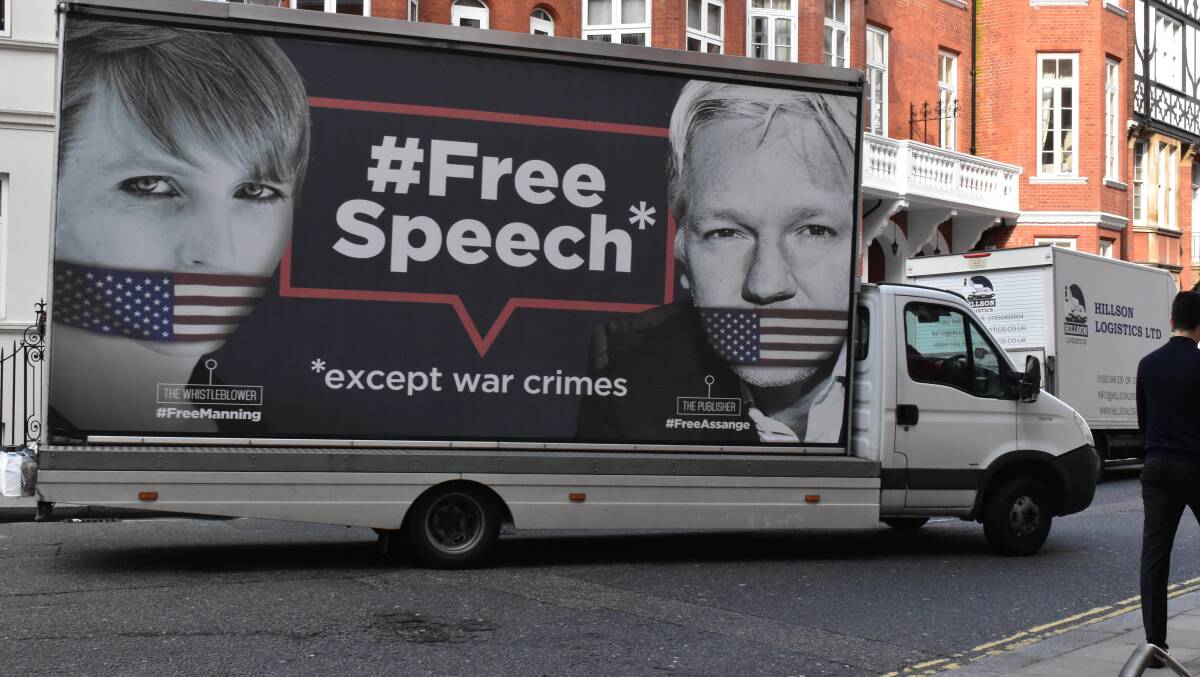 A truck driven through the streets of London depicts gagged whistleblowers Chelsea Manning and Julian Assange. Picture Shutterstock
