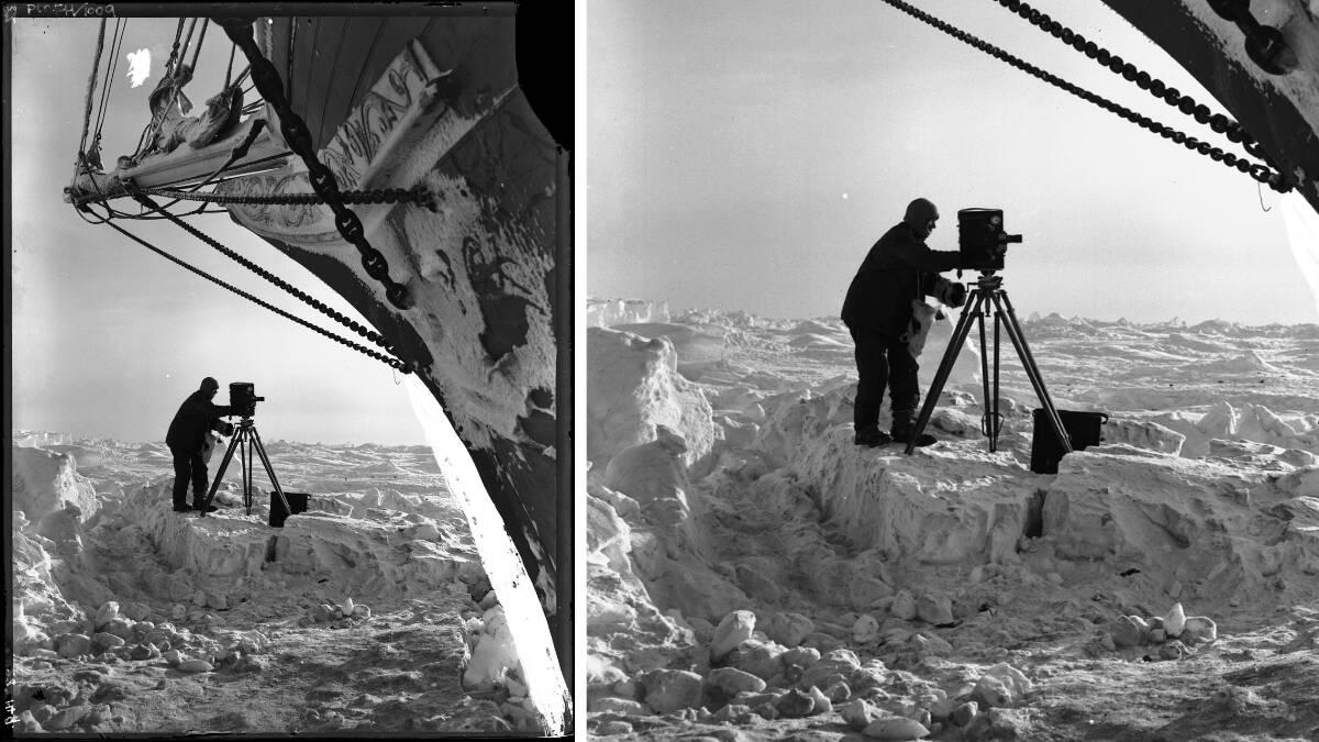 Frank Hurley with camera on ice in front of the bow of the trapped Endurance in the Weddell Sea on the Shackleton expedition in 1915. Picture: Frank Hurley
