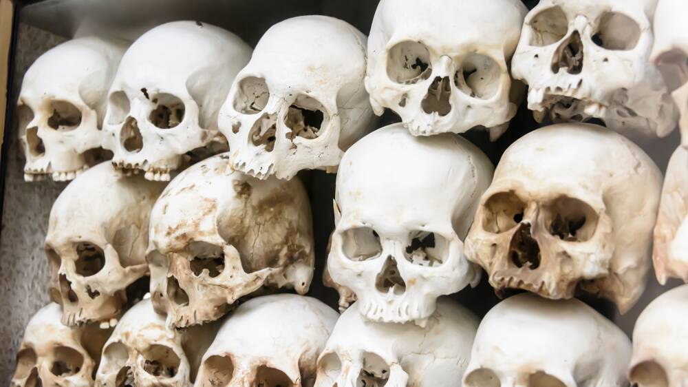 Some of the 9000 skulls piled up inside the Choeung Ek Killing Fields Genocide Centre at Phnom Penh, Cambodia. Picture Shutterstock