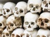 Some of the 9000 skulls piled up inside the Choeung Ek Killing Fields Genocide Centre at Phnom Penh, Cambodia. Picture Shutterstock
