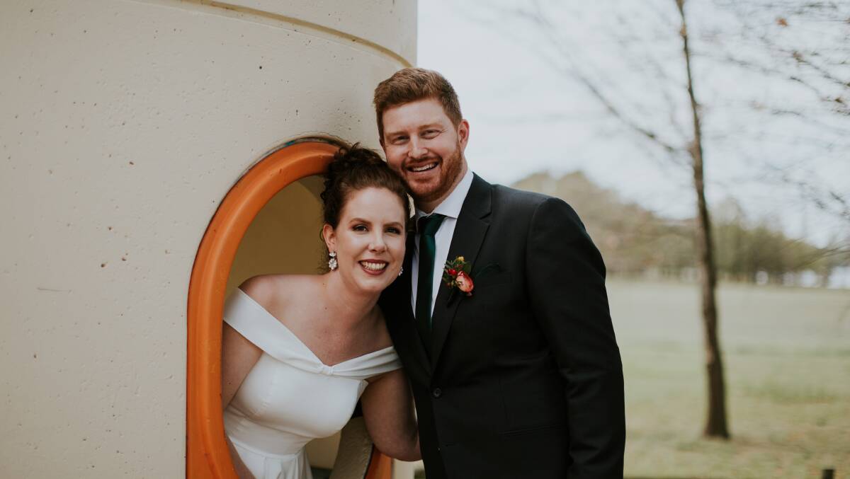 Tammy-Lee Purssell and Corey O'Driscoll had wedding photos taken at this bus shelter in Yarralumla in 2019. Photo by Sarah-Jane Edis Photography
