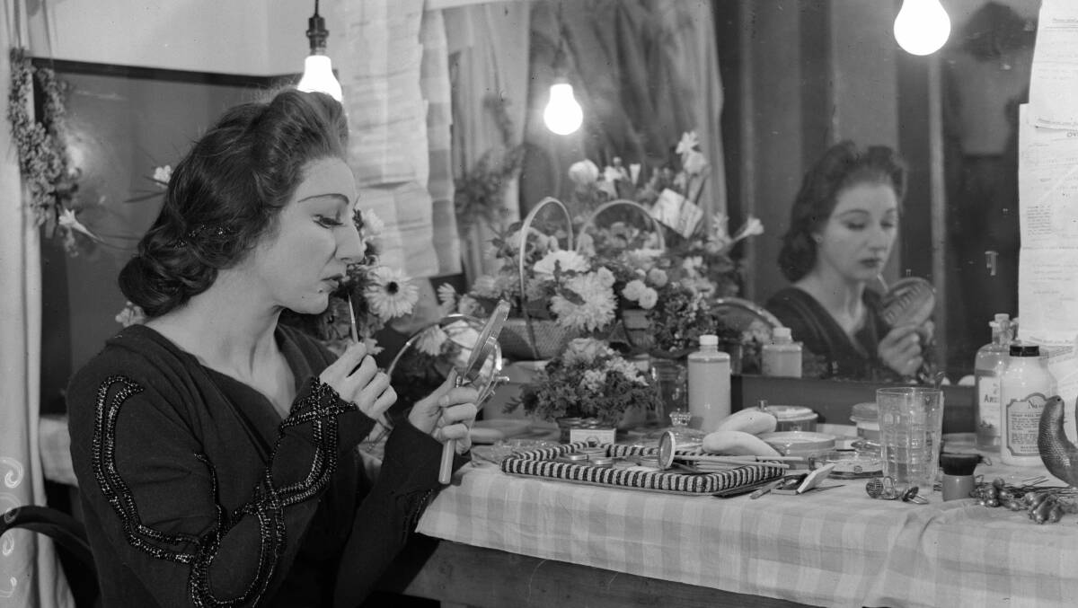 In her dressing room before a performance at London's 'Old Vic' theatre, circa 1937. 