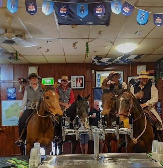 Members of the Gold Trail Reenactments Group enjoy a post-performance drink at a Boorowa Hotel. Picture by Barry O'Mara
